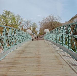 Footbridge against sky