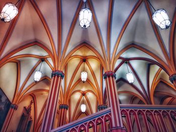 Low angle view of illuminated ceiling of building