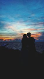 Scenic view of sea at sunset