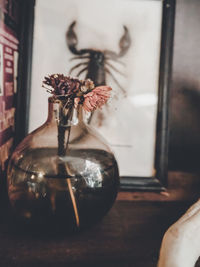 Close-up of vase on table at home
