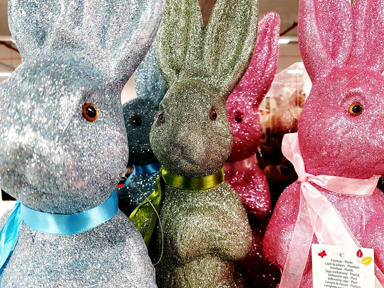 CLOSE-UP OF TOYS FOR SALE IN MARKET STALL