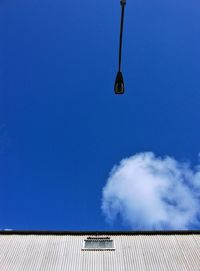 Low angle view of building against blue sky