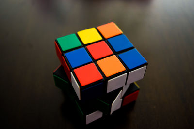 Close-up of colorful puzzle cube on table