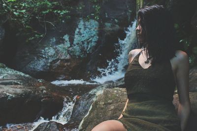 Low section of woman in water