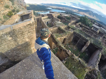 High angle portrait of man on mountain