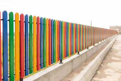 Close-up of multi colored pencils in row