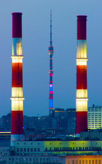 Buildings in city at night