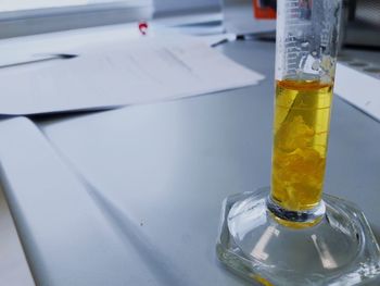 Close-up of glass bottle on table