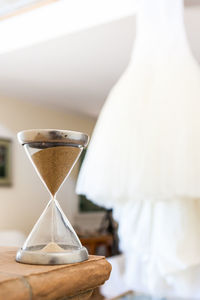 Close-up of clock on table