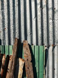 Old and rusty zinc sheet wall. vintage style metal sheet roof texture. pattern of old metal sheet. 