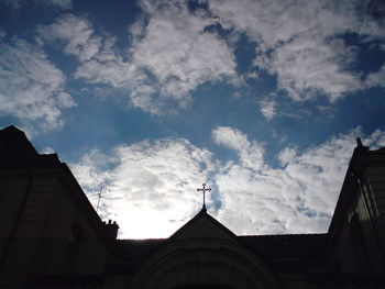 High section of building against cloudy sky