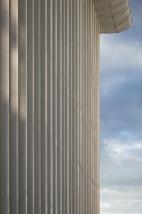 Close-up of building against cloudy sky