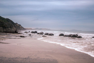 Scenic view of beach against sky