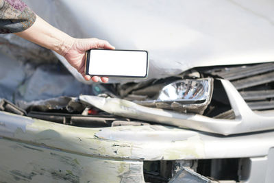 Man using mobile phone in car