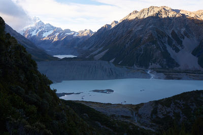 Scenic view of mountains against sky at night