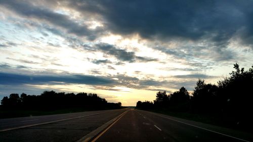 Empty road at sunset