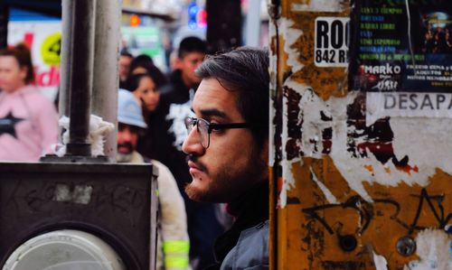 Portrait of young man looking away