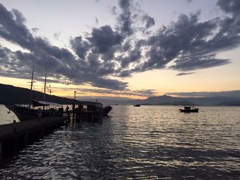 Scenic view of sea against dramatic sky