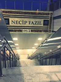 Low angle view of illuminated underground walkway