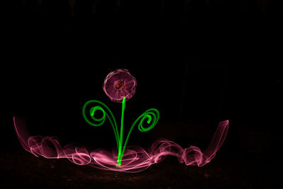 Light painting against black background