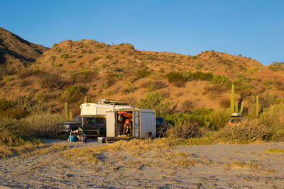 Motor home against mountain at beach