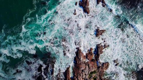 Full frame shot of rocks in sea