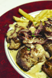 Close-up of served food in plate