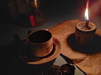 High angle view of coffee light candles on table