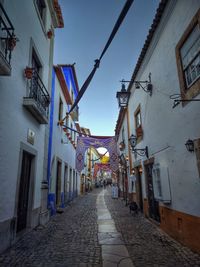 Street amidst buildings in city