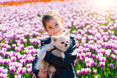 Portrait of girl with pink flowers