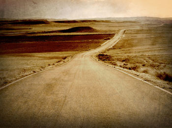 Country road passing through landscape