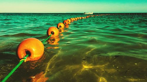 Scenic view of sea against blue sky