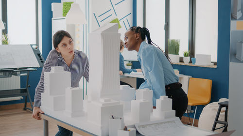 Female doctor explaining to patient in office