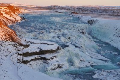 Scenic view of sea against sky during winter