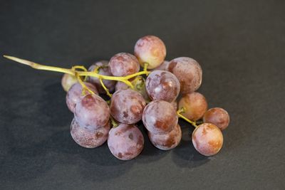 Close-up of fruits against black background