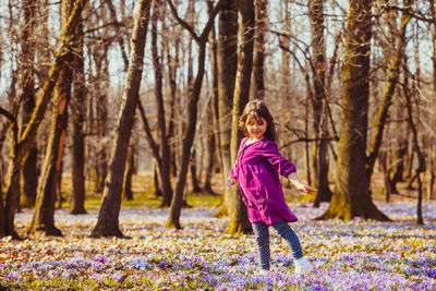 Full length portrait of smiling girl