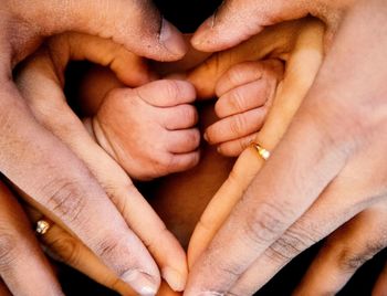 Close-up of woman holding hands