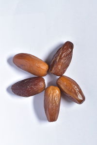 High angle view of fruits against white background