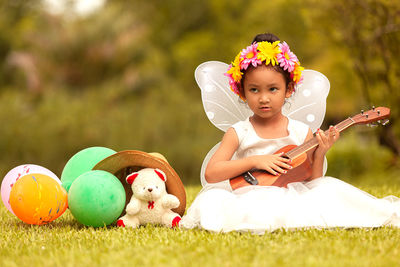 Cute girl playing with toy