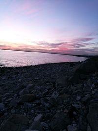 Scenic view of sea against dramatic sky