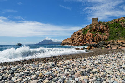 Beach of porto at the western coast of the mediterranean island of corsica