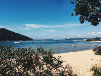 Scenic view of sea against blue sky