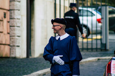 Young man wearing sunglasses standing outdoors