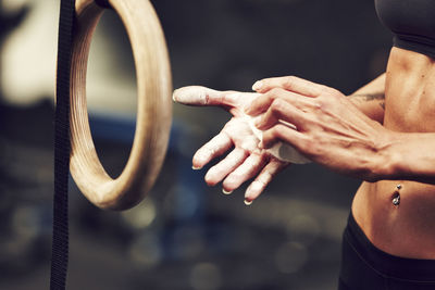 Woman chalking hands