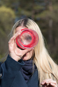 Portrait of woman holding ice cream