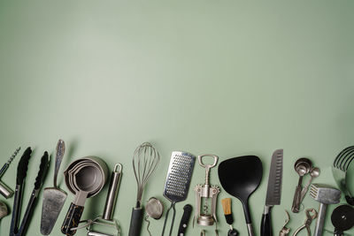 High angle view of kitchen utensils against wall