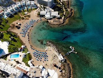 High angle view of city by sea