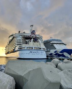 Ship moored in sea against sky