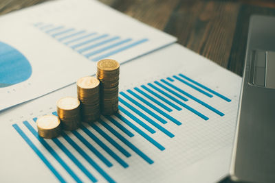 High angle view of coins on table