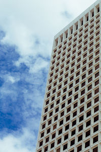 Low angle view of modern building against sky